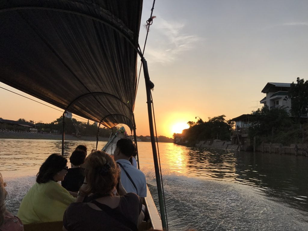 sunset river boat trip on travel in asia