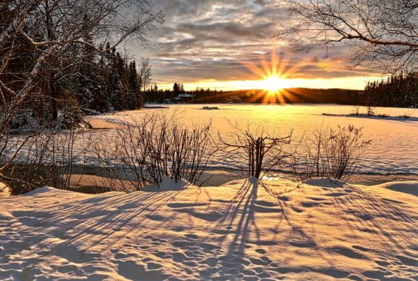 Day 8: 12 Days of Christmas winter solstice sunrise over snowy fields