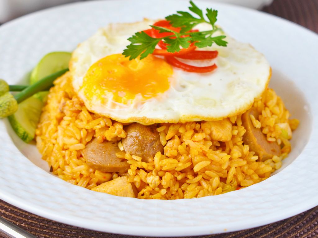 nasi goreng indonesian rice dish with fried egg on top