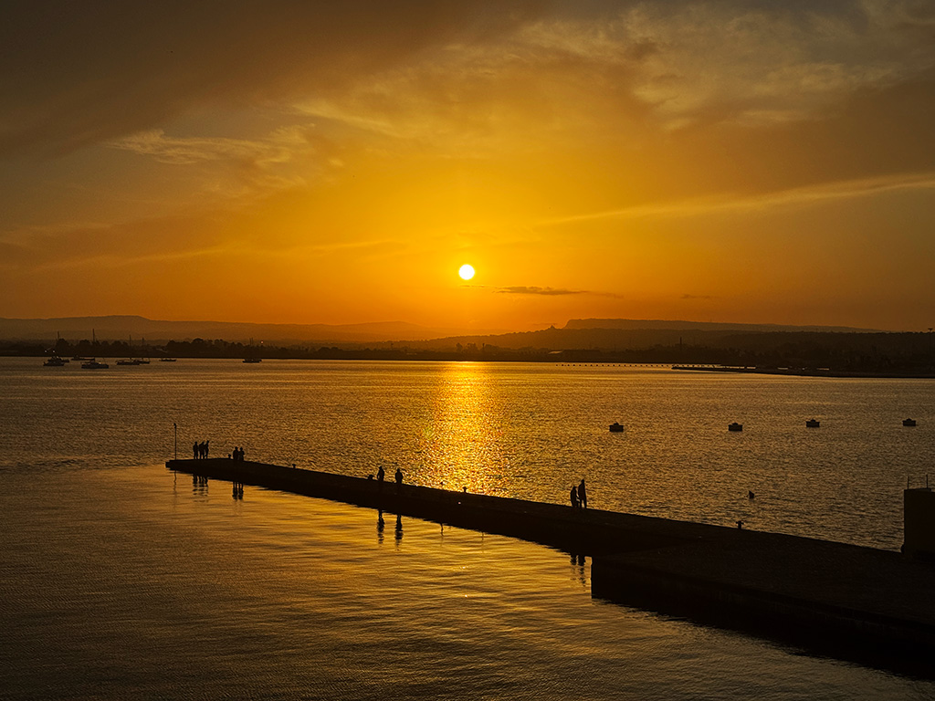 sunset at the end of a day in siracusa and ortigia