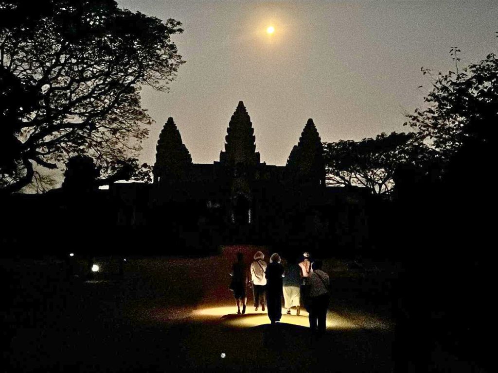 packing for cambodia visits early morning wearing long pants and sleeves