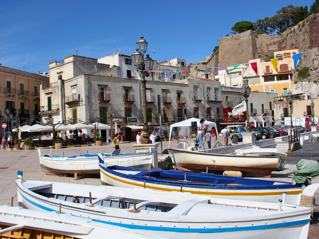 lipari town with wooden row boats in the foreground