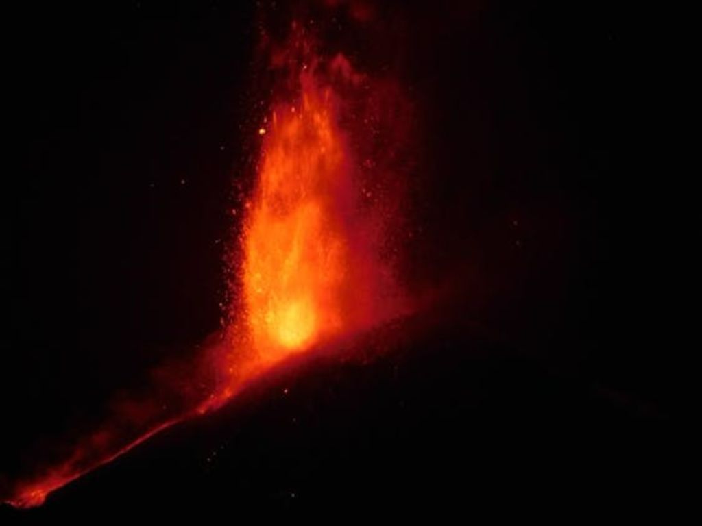 lava eruption from stromboli at night