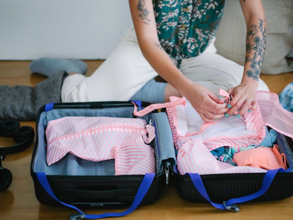 packing suitcase for the ultimate packing list for summer