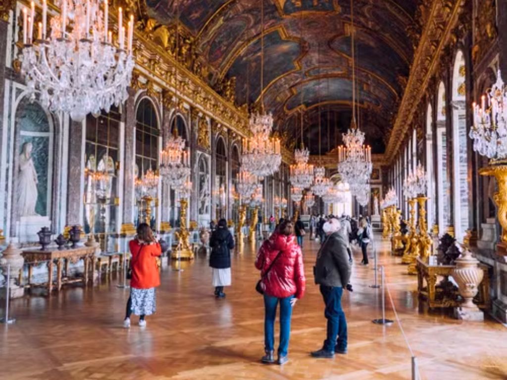 interior of hall of mirrors in versailles day trip from paris in december