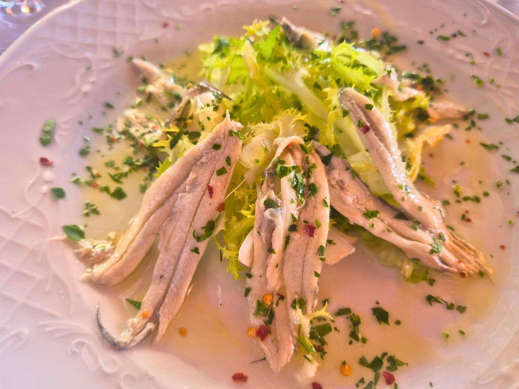 marinated anchovies at a restaurant in positano on the amalfi coast