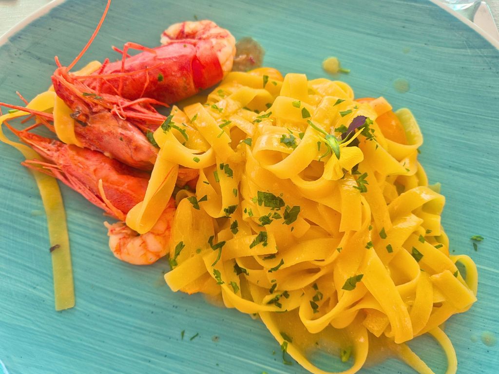 eating and drinking in campania fresh lemon pasta and grilled prawns